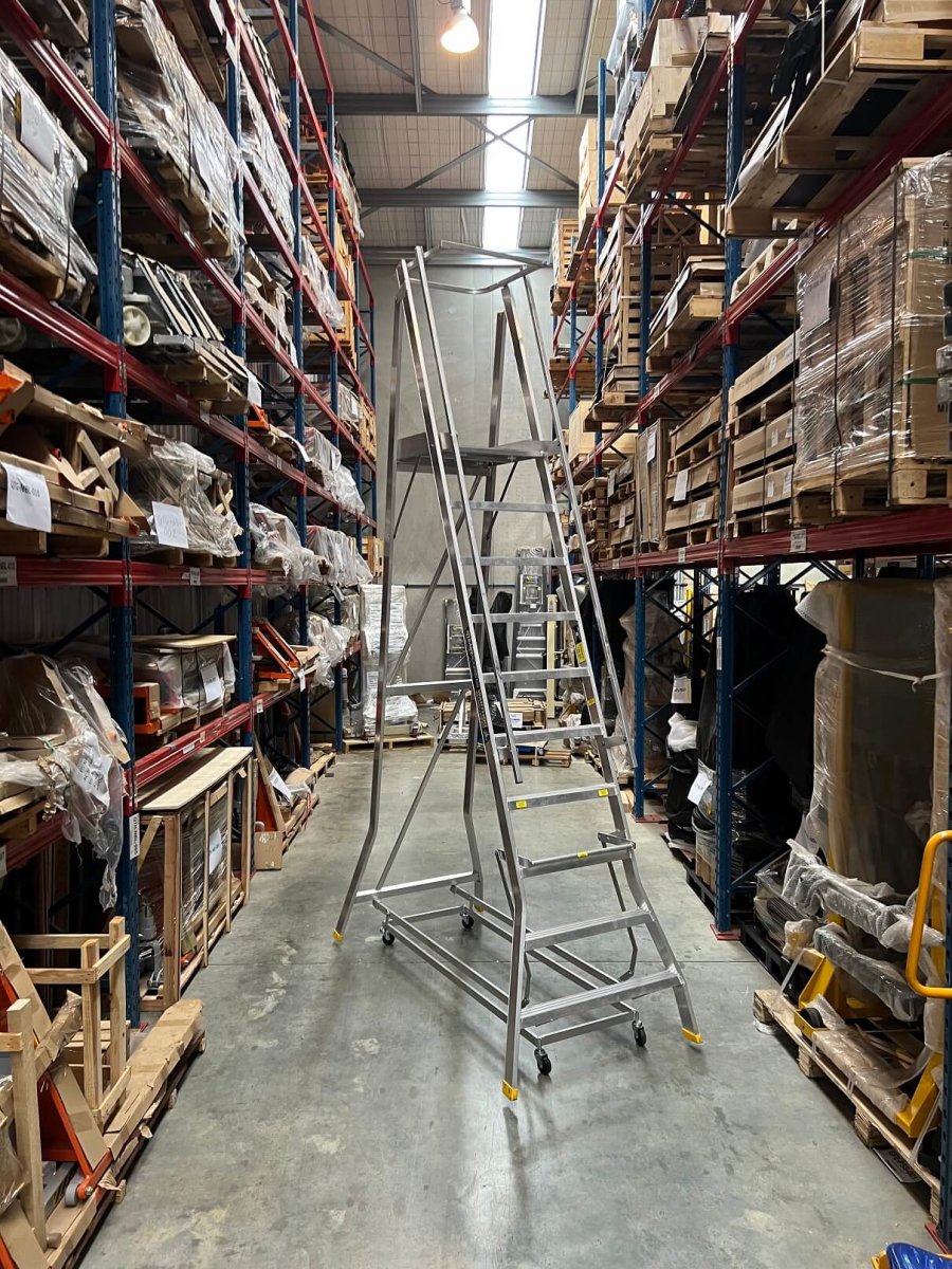 Platform ladder in warehouse on angle